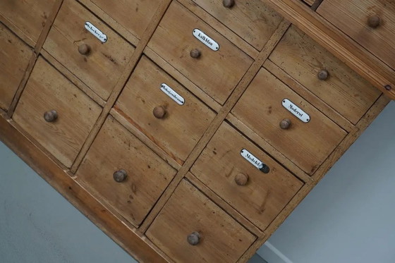 Image 1 of Large antique German apothecary cabinet / display cabinet in pine, early 20th century