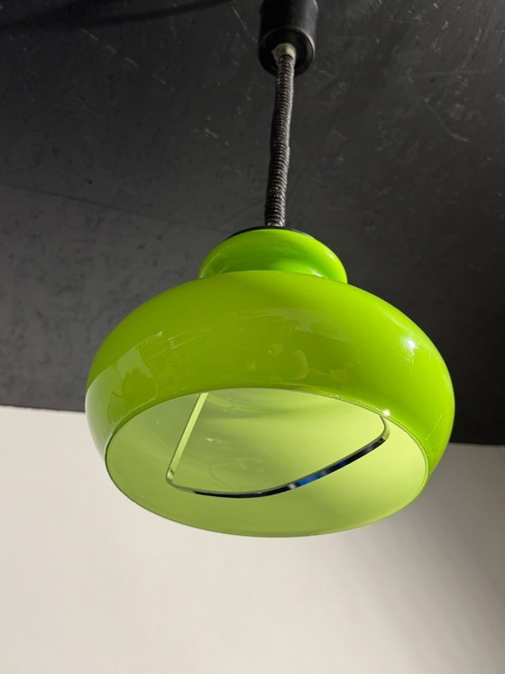 Image 1 of Lampada a sospensione in stile Space Age con paralume in vetro verde, modello Rolly, 1973.