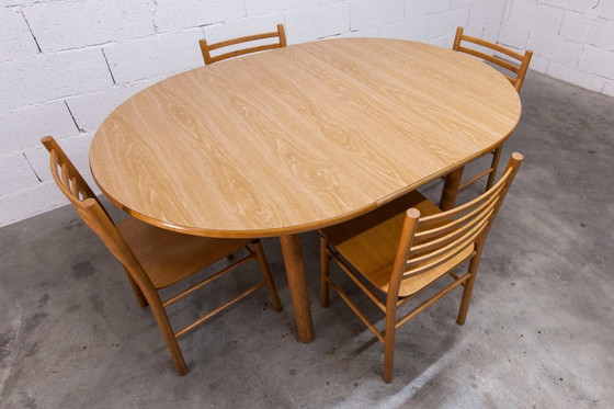 Image 1 of Danish modernist set: convertible round table (114/154cm) + 4 matching chairs, 1980