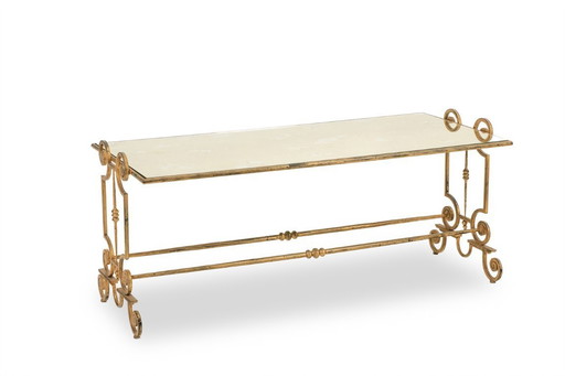Coffee table in gilded wrought iron with an églomisé glass top. 1970s