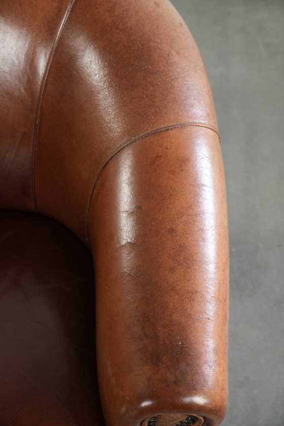 Image 1 of Mooie vintage schapenleren clubfauteuil in Engelse stijl met prachtige diepe kleuren
