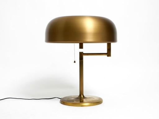 Extraordinary heavy 1960s XXL brass table lamp by Staff with a swivel joint