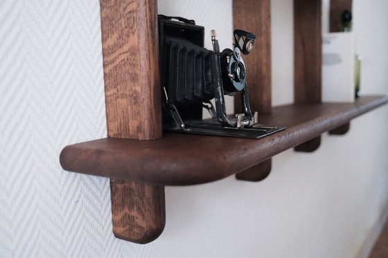 Image 1 of Elegante scaffale da parete in rovere massiccio