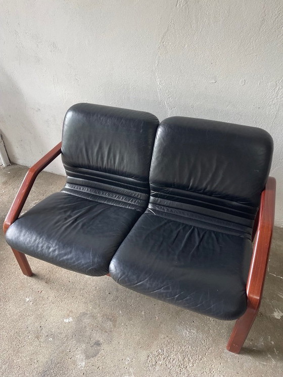 Image 1 of Vintage 2-seater lounge sofa — black leather & solid wood, Italy, 1970s–80s