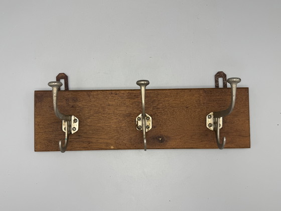 Image 1 of Authentic 1930s coat rack - wood with metal hooks
