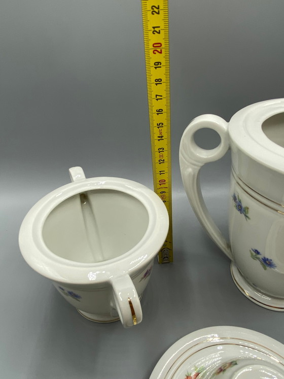 Cafetière, sucrier et tasse en porcelaine de Limoges - Petits motifs floraux et dorures – Objets déco (photo 6 of 8)