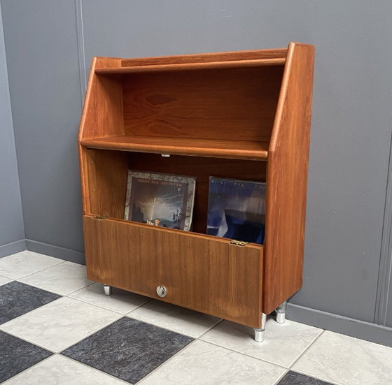 Image 1 of Teak tall sideboard on lucite legs 1960s