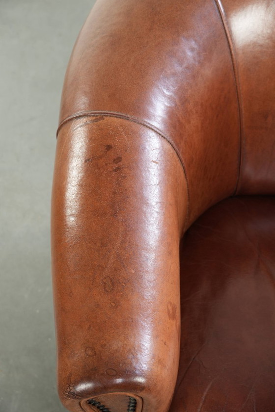 Image 1 of Mooie vintage schapenleren clubfauteuil in Engelse stijl met prachtige diepe kleuren