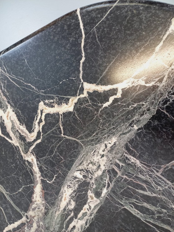 Image 1 of Vintage oval coffee table in black marble from the 1970s