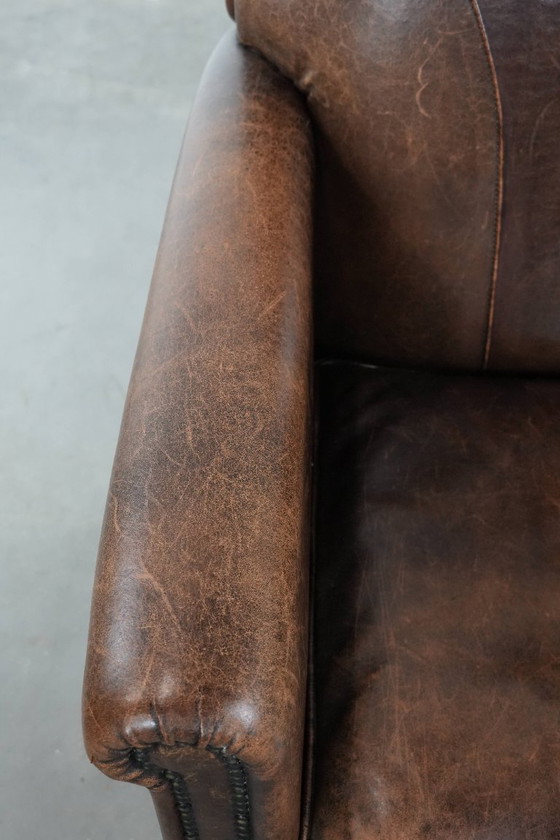 Image 1 of Fauteuil vintage en peau de mouton avec du caractère