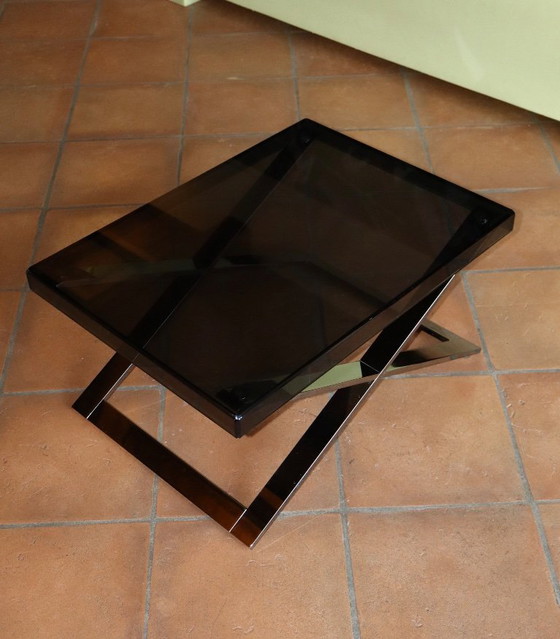 Image 1 of Aster X salontafel van gepolijst verchroomd aluminium en rookglas.