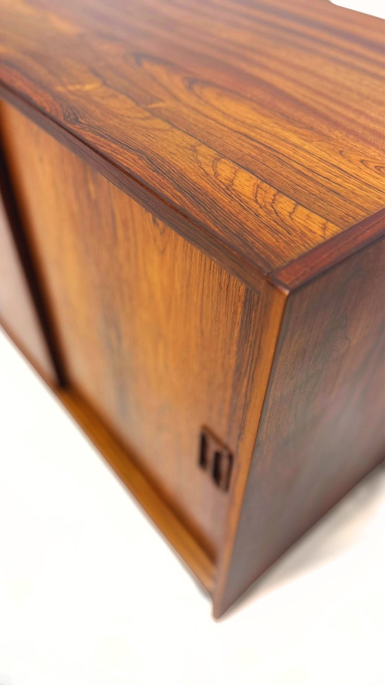 Image 1 of Mid century vintage Danish rosewood cabinet with sliding doors