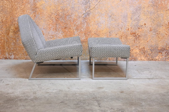 Image 1 of Sillón Leolux Wibber único en tela blanca y negra con otomana.