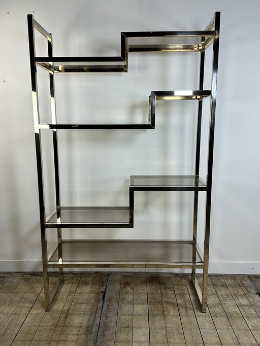 Vintage 1970 bookshelf by Romeo REGA (ITALY) in silver and gold chromed metal. 4 offset shelves with smoked glass.
