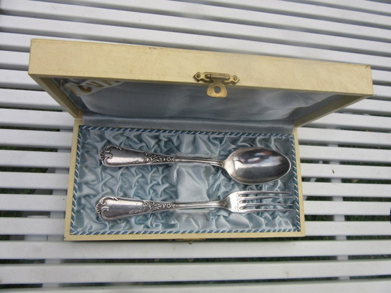 Image 1 of ERCUIS FRANCE Ensemble de couverts (cuillère et fourchette) argentés dans un coffret impeccable