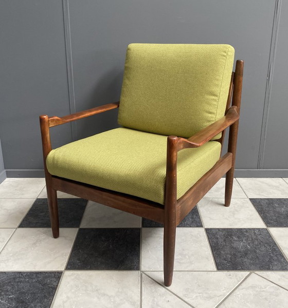 Image 1 of Gele stoffen en houten relaxstoel uit de jaren 60.