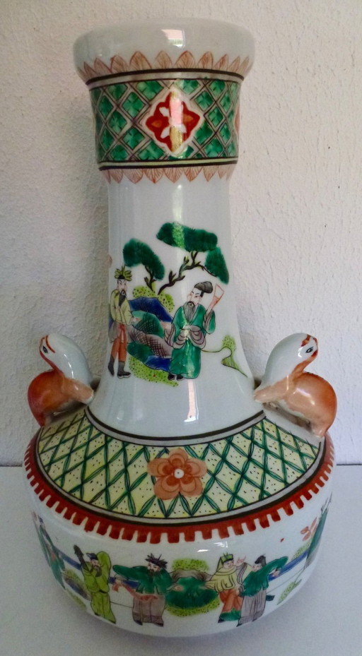 2x Old porcelain Chinese vases with handle in the shape of a squirrel.