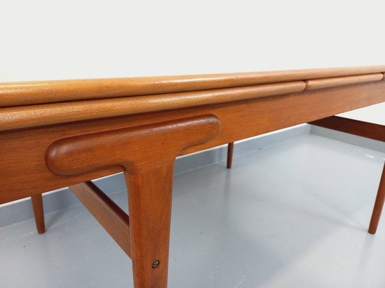 Image 1 of Vintage Scandinavian rectangular dining table by Ejvind A. Johansson from the 50s and 60s in teak with integrated extensions