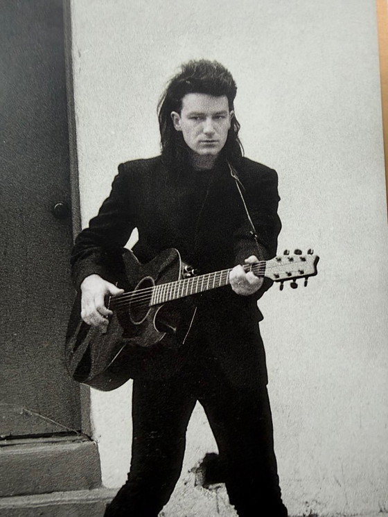 Image 1 of Anton Corbijn, U2 Outside It's America, Photographed by Anton Corbijn, copyright Athena Int.., London 1989, Printed in England