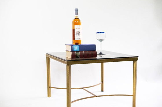 Image 1 of Table basse élégante avec plateau en verre fumé