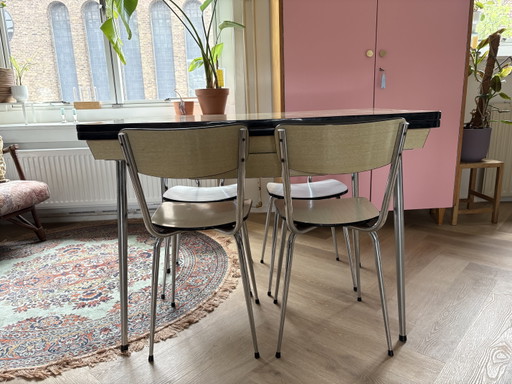 Vintage formica eettafel (uitschuifbaar) met 4 stoelen