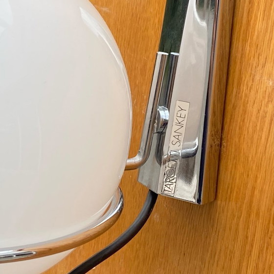 Image 1 of Targeti opaline glass globe and chrome metal wall light