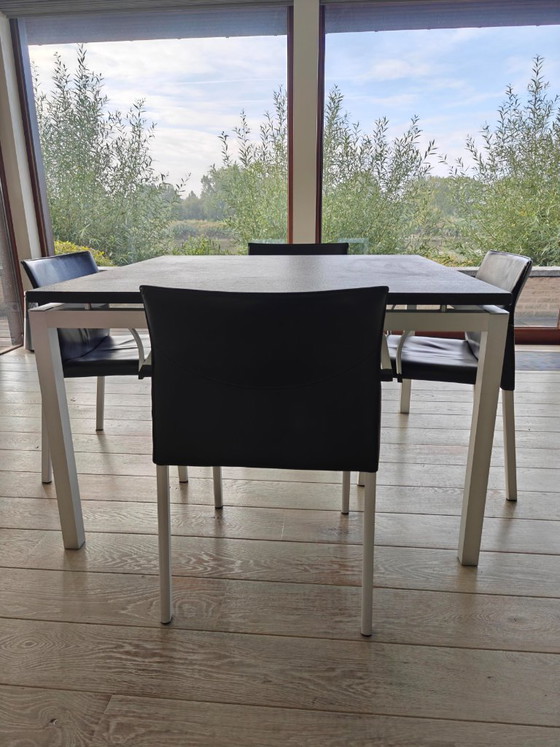 Granite table with Leolux leather chairs – Dining set (photo 4 of 5)