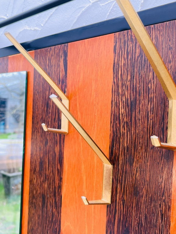 Image 1 of Vintage wandkast met opbergbankje uit de jaren 70.