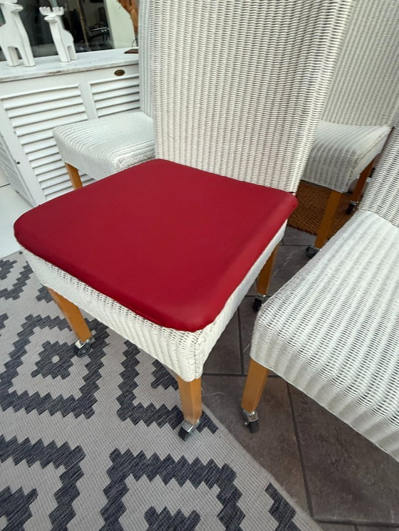 Image 1 of 8 originele Lloyd LOOM stoelen, eetkamerstoelen, ook in kleinere aantallen verkrijgbaar, houten frame, wit riet.