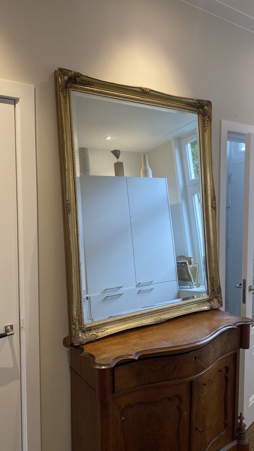 Antique mirror with solid wooden gold frame