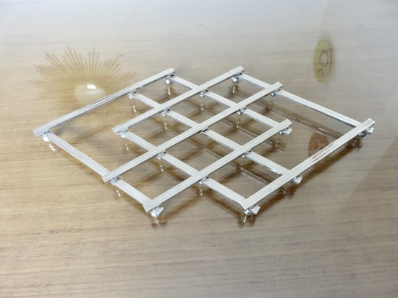 Image 1 of Jacques Adnet extendable silver-plated trivet, 40s 50s