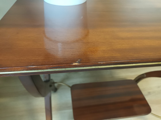 Image 1 of Vintage side table on wheels