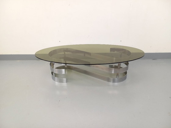 Image 1 of Vintage ovale salontafel van rookglas en verchroomd metaal uit de jaren 70.