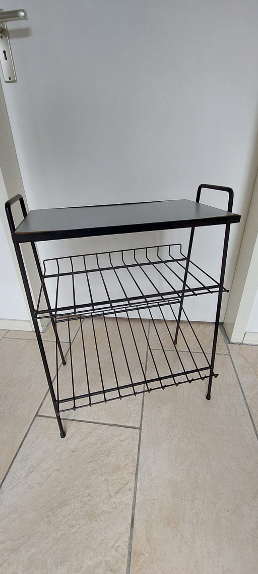 Vintage dubbele lectuurrek van zwart metaal met formica blad