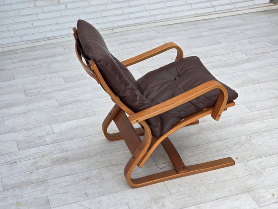 Image 1 of Fauteuil danois des années 1970 de la marque Komfort, cuir, toile et bois courbé.