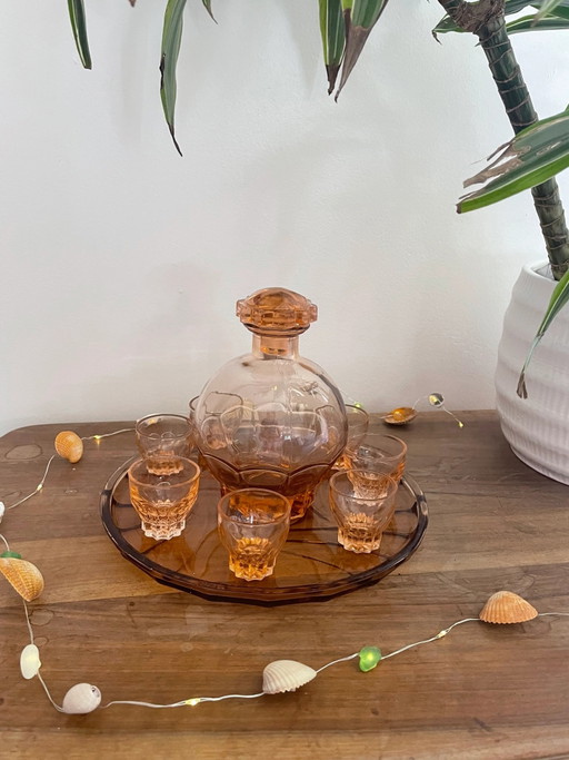Juego de licor de cristal rosa