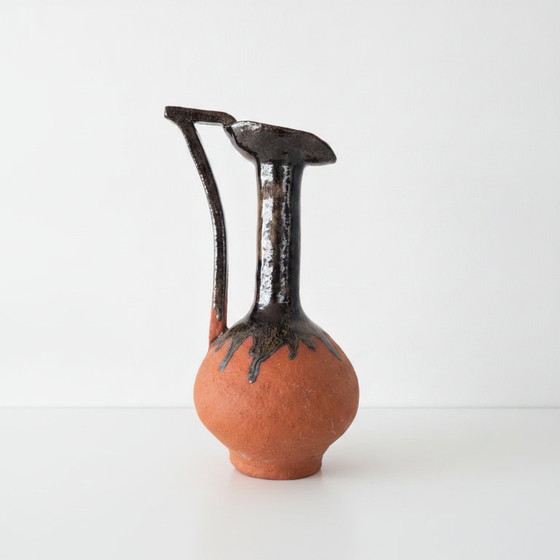 Terracotta ceramic vase with dark metallic drip glaze (photo 3 of 6)