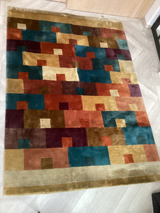 Image 1 of Tapis en laine de créateur, nettoyé, en bon état.