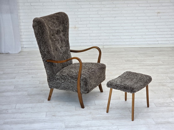 Image 1 of 1960s Reupholstered Danish Armchair with Stool, Genuine Sheepskin
