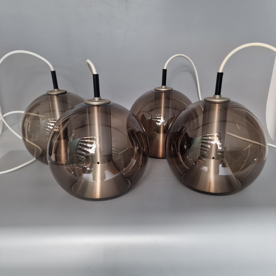 Image 1 of Set of 4 Pendant Lamps - Raak Amsterdam - Design Frank Ligtelijn - 1970s - Smoked glass