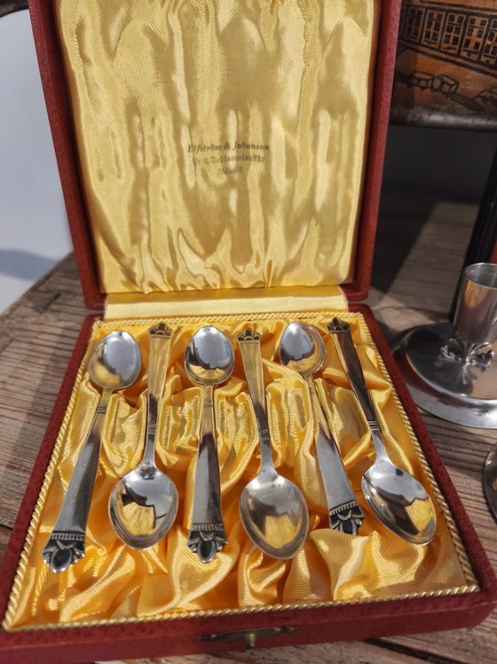 Image 1 of Posate antiche, candeliere e contenitore in argento del 1919.