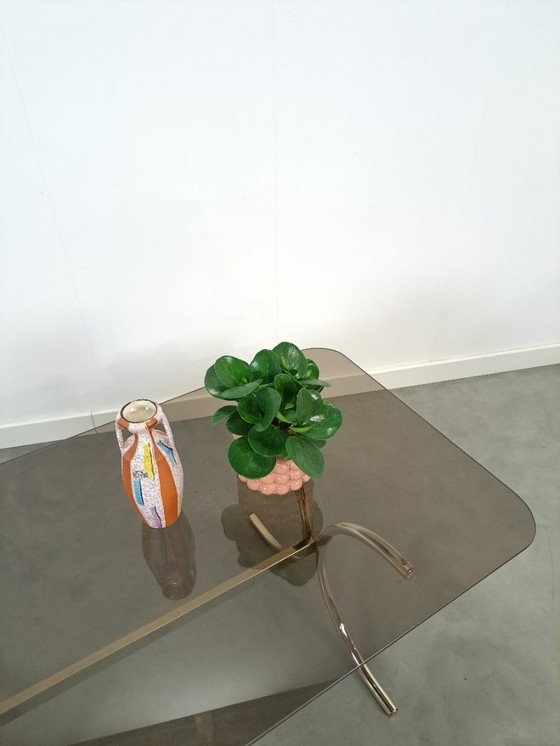 Image 1 of Tavolino in vetro fumé con gambe dorate dalla Svezia