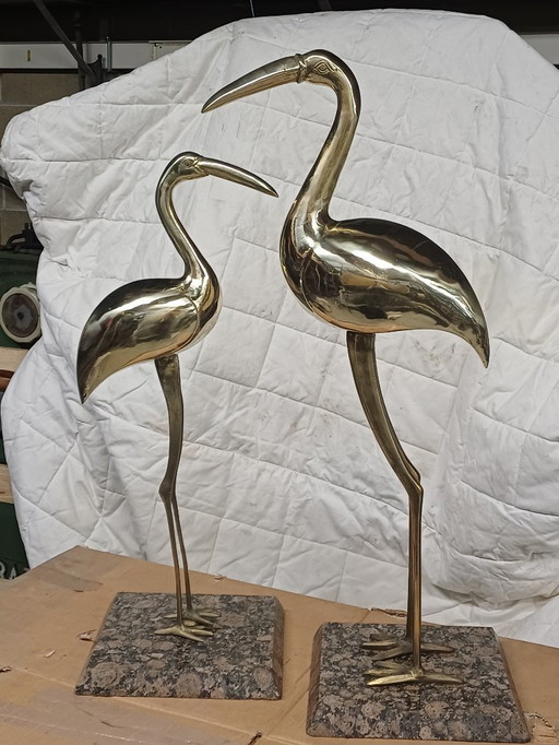 Statues de flamants roses en laiton