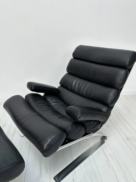 Image 1 of COR Sinus loungestoel en poef in zwart leer van Reinhold Adolf & Hans-Jürgen Schröpfer – Designicoon uit de jaren 70