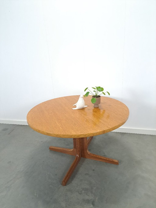 Round oval oak extendable dining table