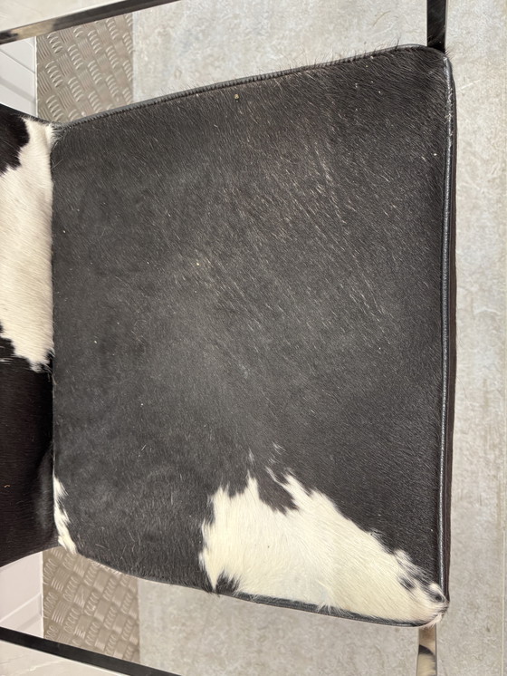 Image 1 of Silla de diseño de lujo en aluminio cromado con piel de vaca auténtica.