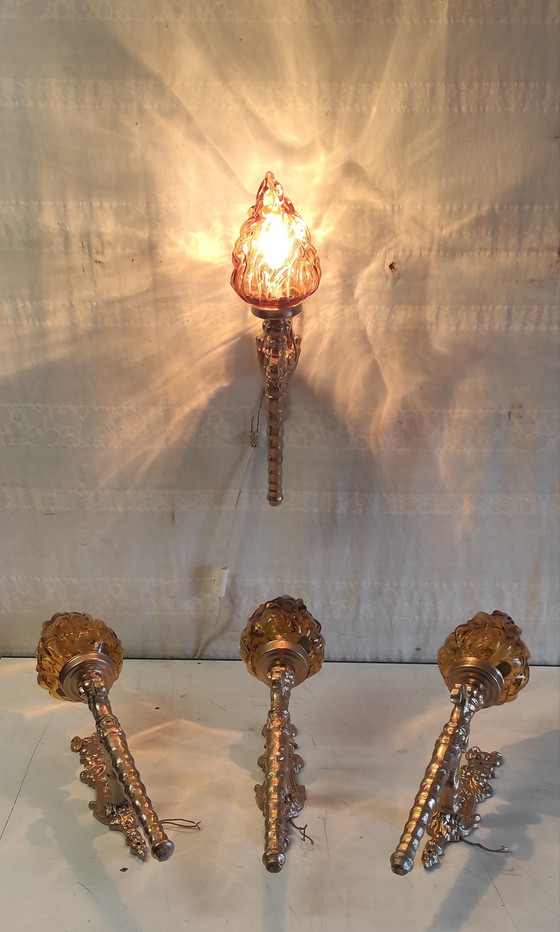 Image 1 of Torch-style wall sconces in gilded cast aluminum and glass - mid-20th century