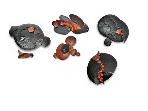 Set of brutalist wall sculptures signed B + D, circa 1965–1975