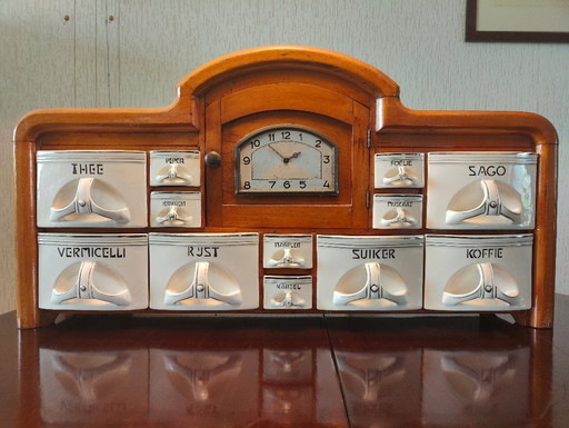 Armario para especias Art Déco antiguo con reloj en funcionamiento