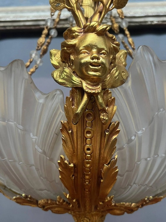 Gouden bronzen kroonluchter in Lodewijk XVI-stijl. 12 lichtpunten. (photo 7 of 8)